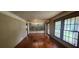 This dining room features hardwood floors, large windows for natural light, and classic molding, perfect for Gathering gatherings at 2886 The Fontainebleau Sw, Atlanta, GA 30331