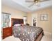 Cozy bedroom with a large bed, side tables, and windows providing natural light at 3716 Meeting St, Duluth, GA 30096
