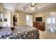 Spacious bedroom with vaulted ceiling, walk-in closet, and media cabinet at 3716 Meeting St, Duluth, GA 30096