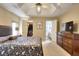 Spacious bedroom with vaulted ceiling, walk-in closet, and attached bathroom view at 3716 Meeting St, Duluth, GA 30096