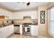 Bright kitchen with stainless steel appliances and granite countertops provides a modern touch at 3716 Meeting St, Duluth, GA 30096