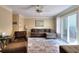 Inviting living room with neutral tones, comfortable seating, and lots of natural light at 3716 Meeting St, Duluth, GA 30096