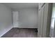 Bedroom with gray walls and carpeted floors, offering a cozy and neutral space at 1091 Luther Sw Dr, Mableton, GA 30126