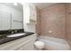 Bathroom featuring tile surround tub, white vanity, and granite countertops at 1468 Briarwood Ne Rd # 2003, Atlanta, GA 30319