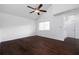 Vaulted ceiling bedroom offers a ceiling fan and a bright window at 1468 Briarwood Ne Rd # 2003, Atlanta, GA 30319