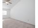 Bright and spacious bedroom features a ceiling fan, vaulted ceiling, and large window at 1468 Briarwood Ne Rd # 2003, Atlanta, GA 30319