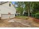 Spacious backyard featuring a garage, porch, and a fenced in yard at 1768 San Andra Dr, Marietta, GA 30062