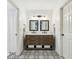 Well-lit bathroom with dual vanity, decorative mirrors and storage at 1768 San Andra Dr, Marietta, GA 30062