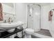 Bathroom with a corner shower, vanity, and neutral colors at 1768 San Andra Dr, Marietta, GA 30062