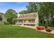 Lovely cape cod home with a welcoming front porch and vibrant landscaping at 1768 San Andra Dr, Marietta, GA 30062
