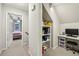 Upstairs hallway with access to bedroom and bonus room with built-in desk at 1768 San Andra Dr, Marietta, GA 30062