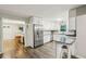 Bright kitchen with stainless steel appliances, granite countertops and eat-in breakfast bar at 1768 San Andra Dr, Marietta, GA 30062