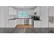 Well-lit kitchen with stainless steel appliances and ample counter space at 4440 Coventry Ne Ct, Roswell, GA 30075