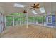 Spacious screened porch with wood flooring, skylights and wooded views at 4440 Coventry Ne Ct, Roswell, GA 30075