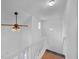 Bright stairwell features a wooden staircase, and a unique ceiling light fixture at 4440 Coventry Ne Ct, Roswell, GA 30075