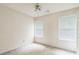 Bedroom with neutral carpet and two windows bringing in plenty of natural light at 745 Birchberry Sw Ter, Atlanta, GA 30331