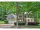 Charming two-story home with attached garage and mature landscaping at 745 Birchberry Sw Ter, Atlanta, GA 30331