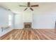 Bright living room featuring a fireplace and hardwood floors at 745 Birchberry Sw Ter, Atlanta, GA 30331