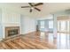 Bright living room featuring a fireplace and hardwood floors at 745 Birchberry Sw Ter, Atlanta, GA 30331