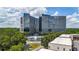 Aerial shot featuring an office building, lush trees, and a fountain showcasing a harmonious blend of nature and architecture at 1626 Aldworth Se Pl, Atlanta, GA 30339