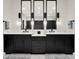 Bathroom showcasing double vanity with white countertops and framed mirrors with stylish lighting at 1626 Aldworth Se Pl, Atlanta, GA 30339