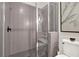 Modern bathroom features a glass shower and contemporary fixtures at 1626 Aldworth Se Pl, Atlanta, GA 30339