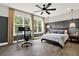 Bedroom featuring neutral decor, hardwood floors, a ceiling fan, and lots of natural light at 1626 Aldworth Se Pl, Atlanta, GA 30339
