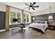 Bedroom featuring neutral decor, hardwood floors, a ceiling fan, and lots of natural light at 1626 Aldworth Se Pl, Atlanta, GA 30339