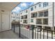 Balcony view of modern townhomes with multiple levels and private garages; outdoor living at its finest at 230 New St # 2102, Decatur, GA 30030