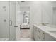 Modern bathroom featuring a walk-in shower, double vanity, and stylish finishes at 230 New St # 2102, Decatur, GA 30030