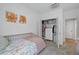 Well-lit bedroom featuring a closet and adjacent bathroom at 230 New St # 2102, Decatur, GA 30030