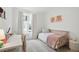 Charming bedroom featuring a desk, carpet, and natural light at 230 New St # 2102, Decatur, GA 30030