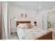 Well-lit bedroom with plush carpet and view into ensuite bathroom at 230 New St # 2102, Decatur, GA 30030