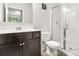 Bright bathroom featuring vanity, toilet and enclosed shower stall at 3219 Colchester St, Douglasville, GA 30135