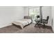 Small bedroom that is carpeted with window, desk, and chair set up for office at 3219 Colchester St, Douglasville, GA 30135