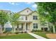 Charming two-story home with a welcoming front porch and well-manicured lawn at 3219 Colchester St, Douglasville, GA 30135