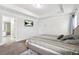 Serene main bedroom with tray ceiling, plush carpeting, and en-suite bathroom at 3219 Colchester St, Douglasville, GA 30135