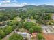 Aerial view of a stunning house with a detached garage in a neighborhood at 3415 Trickum Rd, Woodstock, GA 30188
