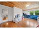 Finished bonus room features wood ceiling, hardwood floors, closet and ample storage space at 3415 Trickum Rd, Woodstock, GA 30188