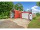 A spacious garage and carport provide ample parking with room for storage at 3415 Trickum Rd, Woodstock, GA 30188