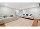 Inviting living area with modern sofas, a cozy rug, and a peaceful atmosphere for relaxation at 3415 Trickum Rd, Woodstock, GA 30188