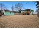 Spacious backyard with a covered patio and a detached garage at 6100 Prestige Valley Rd, Morrow, GA 30260