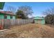 Backyard featuring a detached garage with ample yard space at 6100 Prestige Valley Rd, Morrow, GA 30260