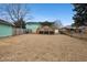 Spacious backyard with a covered patio and a well-maintained lawn at 6100 Prestige Valley Rd, Morrow, GA 30260