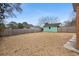 Fenced backyard with a detached garage at 6100 Prestige Valley Rd, Morrow, GA 30260