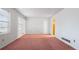View of the bedroom with pink carpet and natural light at 6100 Prestige Valley Rd, Morrow, GA 30260