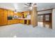 Spacious kitchen with tile floor, wood cabinets, and stainless appliances at 6100 Prestige Valley Rd, Morrow, GA 30260