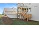 Backyard view of home with deck, patio, and landscaped yard at 739 Marlay Sw Ln, Powder Springs, GA 30127