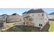 Backyard view of home with deck, patio, and landscaped yard at 739 Marlay Sw Ln, Powder Springs, GA 30127