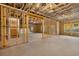 Spacious unfinished basement with exposed ceiling joists and framing with large windows at 739 Marlay Sw Ln, Powder Springs, GA 30127